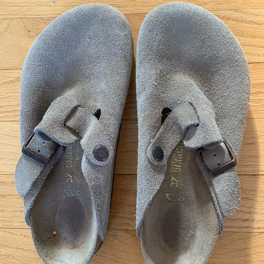 Brown leather Birkenstock slides